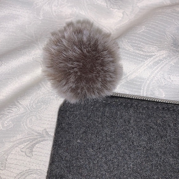 Gray bag with the Letter H, has Pom Pom on zipper - Picture 5 of 7